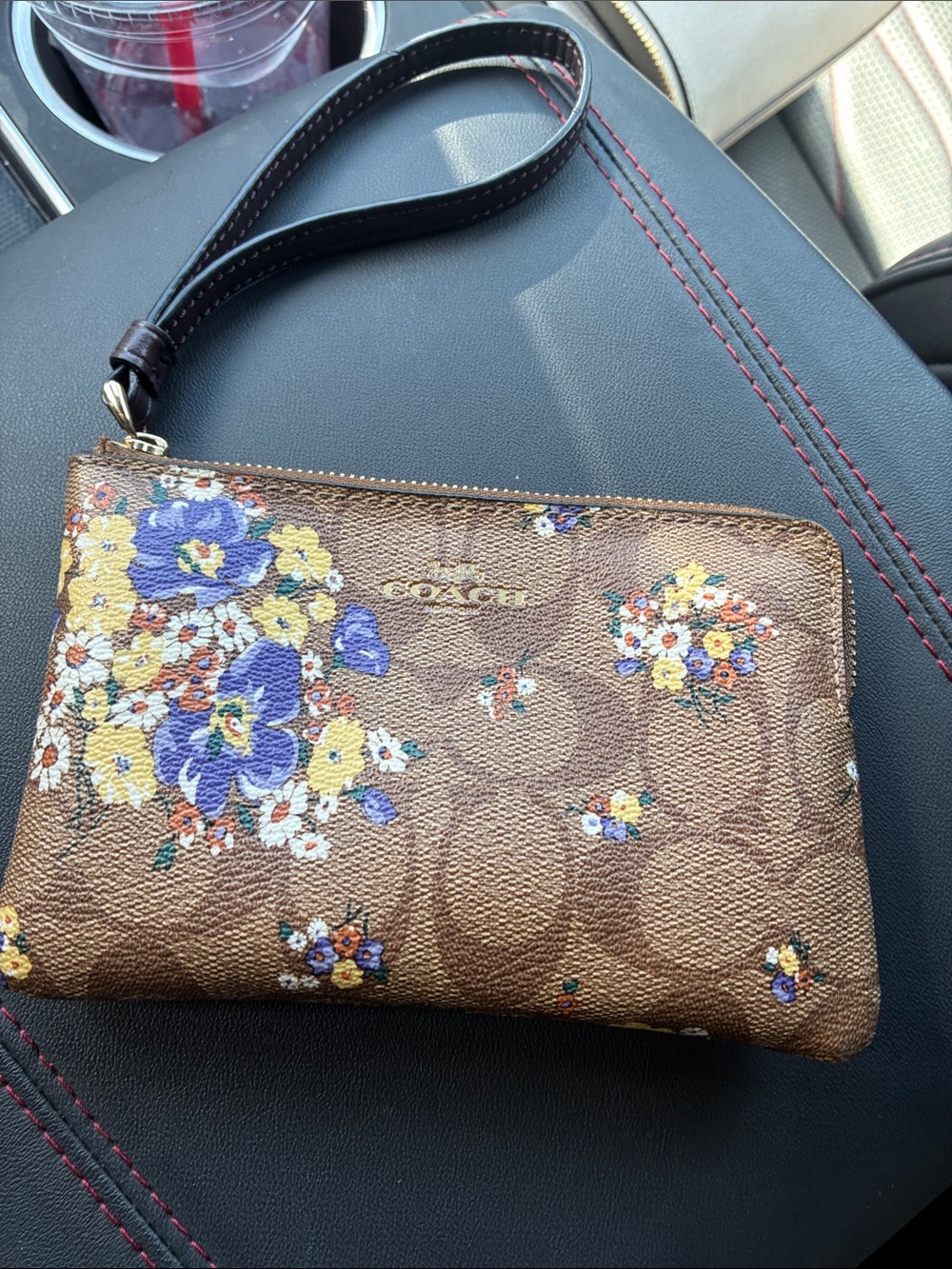 Coach Brown Signature Floral Wristlet with Purple & Yellow Accents